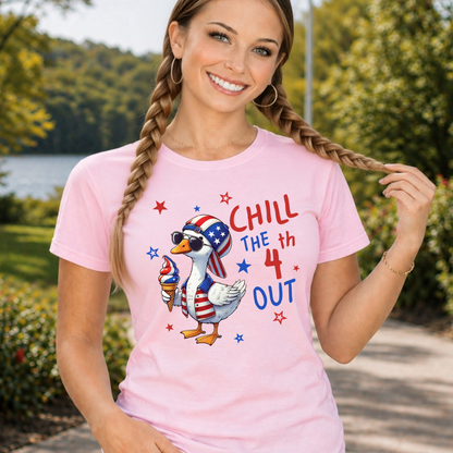Woman wearing a pink t-shirt with a 4th of July design, standing outdoors.