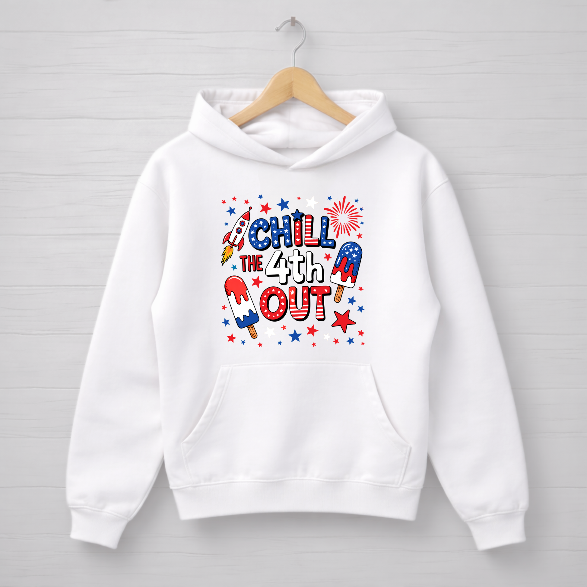 White hoodie with 'Chill the 4th Out' text and graphics on a wooden hanger against a light gray background