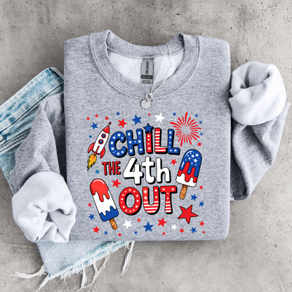 Gray sweatshirt with 4th of July-themed design on a concrete surface