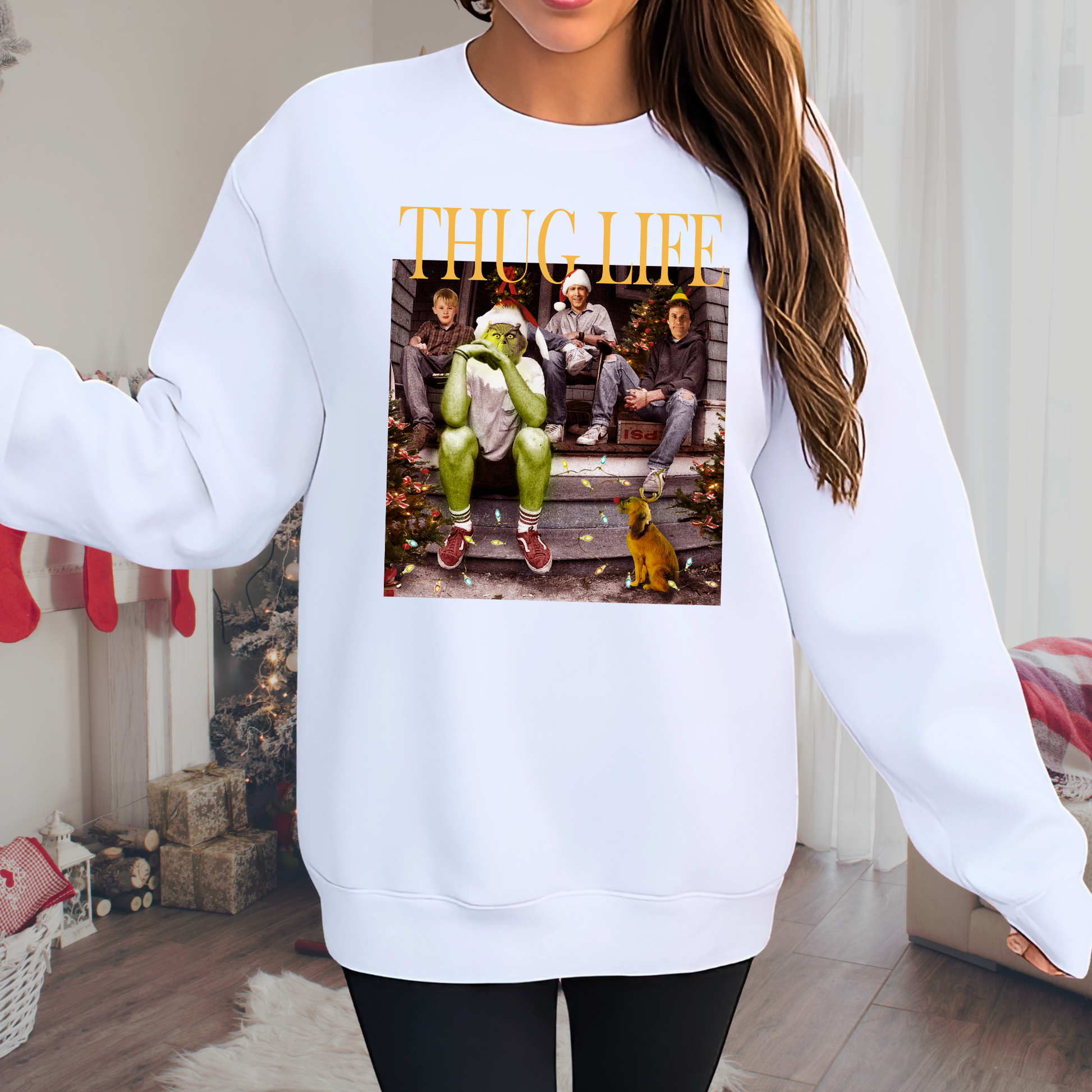 White unisex sweatshirt with It’s Hard Out Here for a Grinch graphic, winter street-style holiday design.