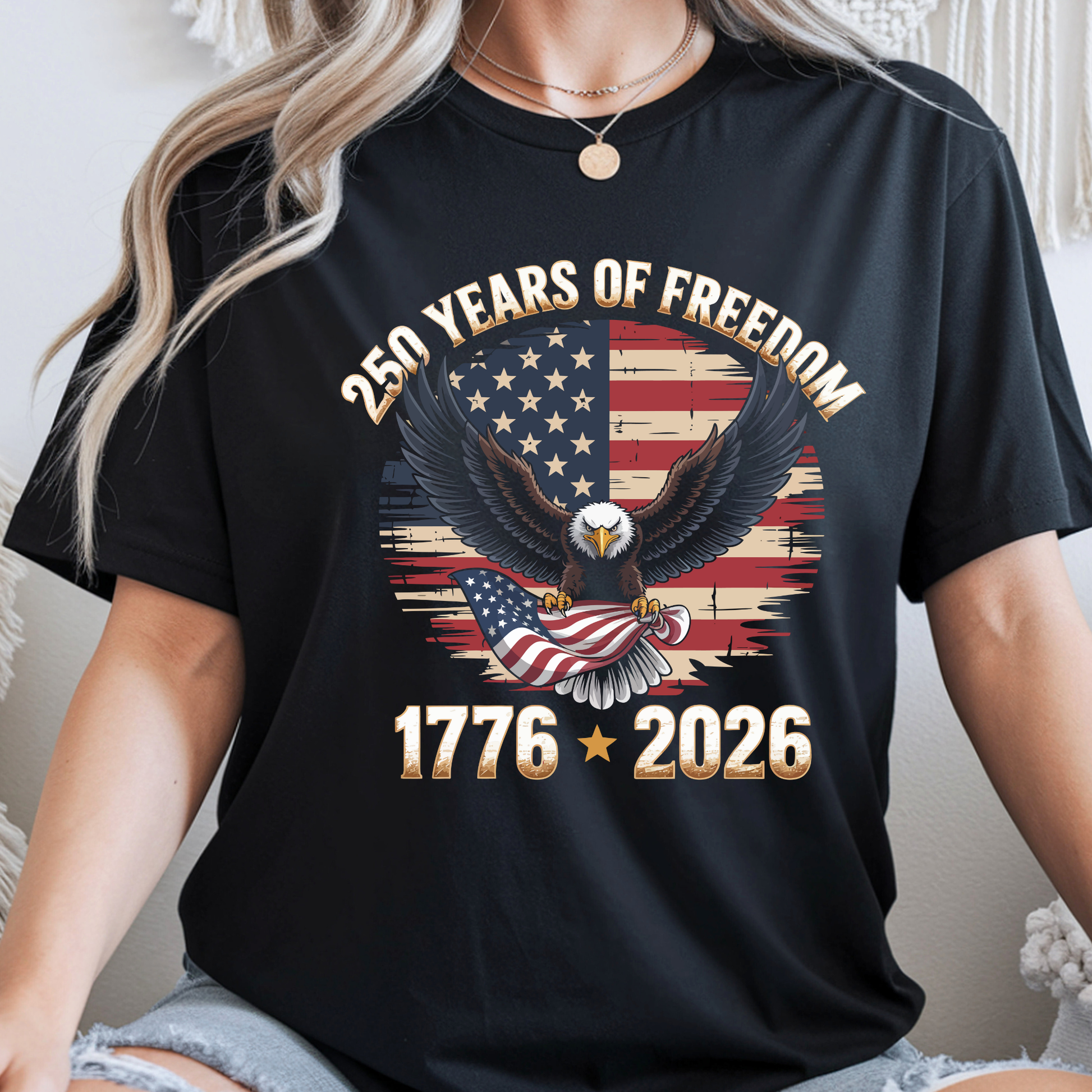 Close up of black women’s patriotic shirt with America 250 eagle