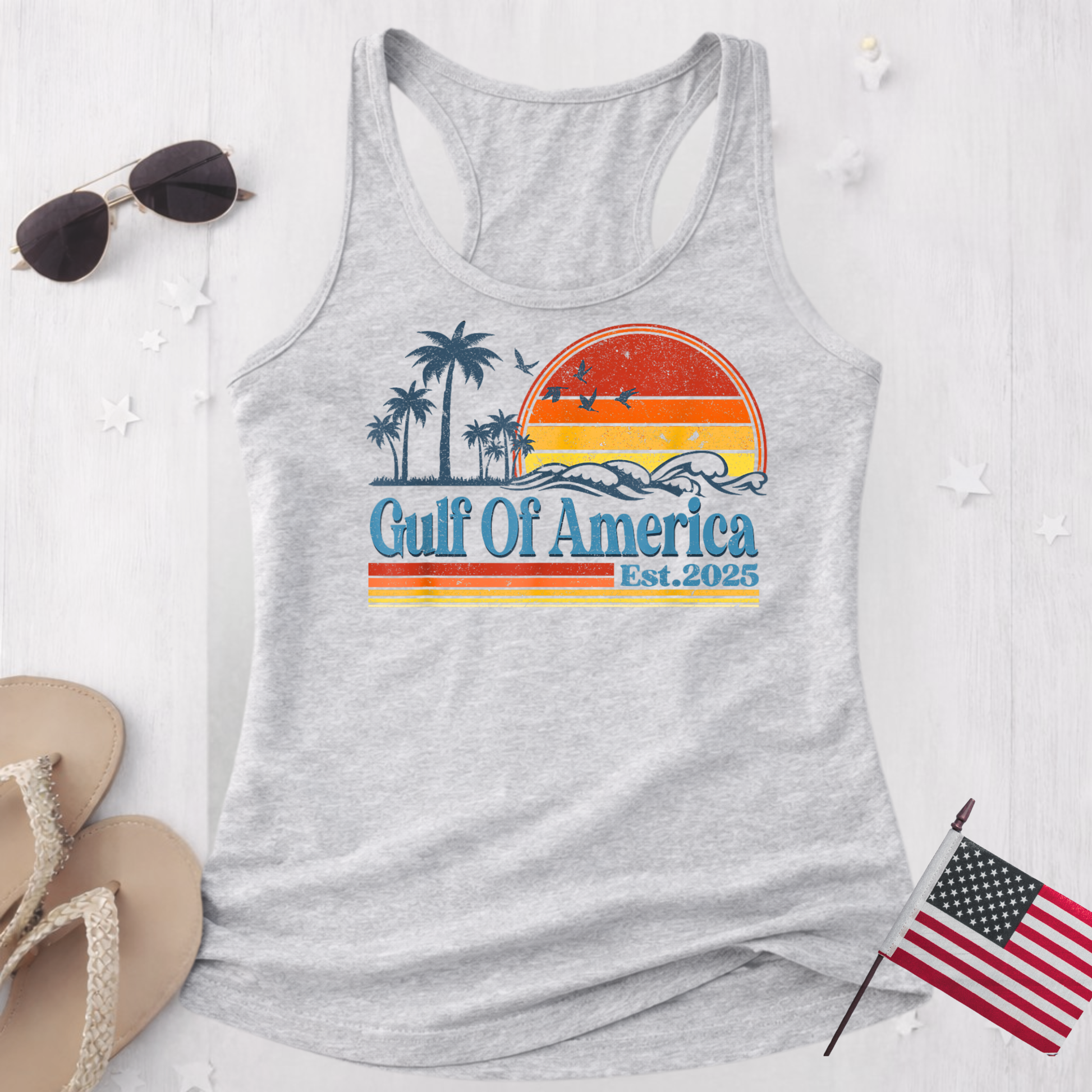 Sports gray Gulf of America tank top flat lay, patriotic graphic tank with sunset and palm trees design