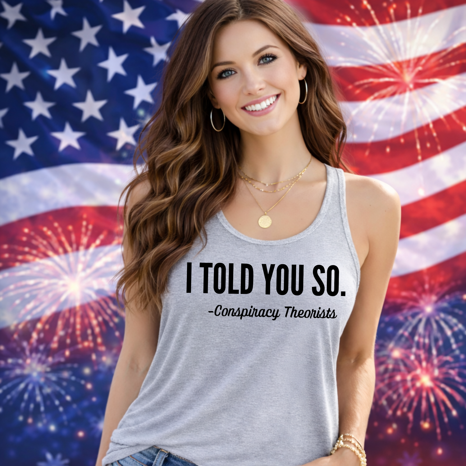 Woman wearing gray tank top with I Told You So quote in front of American flag fireworks background, patriotic graphic tank women summer outfit