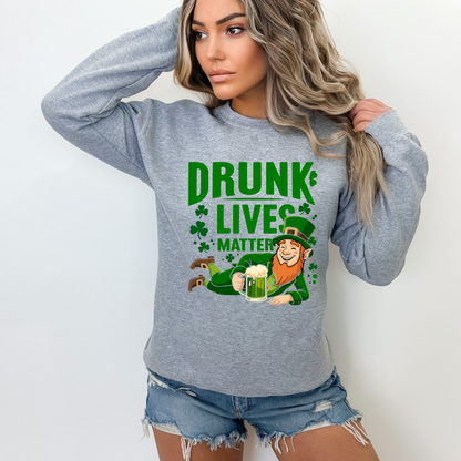 Woman wearing a gray “Drunk Lives Matter” sweatshirt with leprechaun graphic, St. Patrick’s Day outfit
