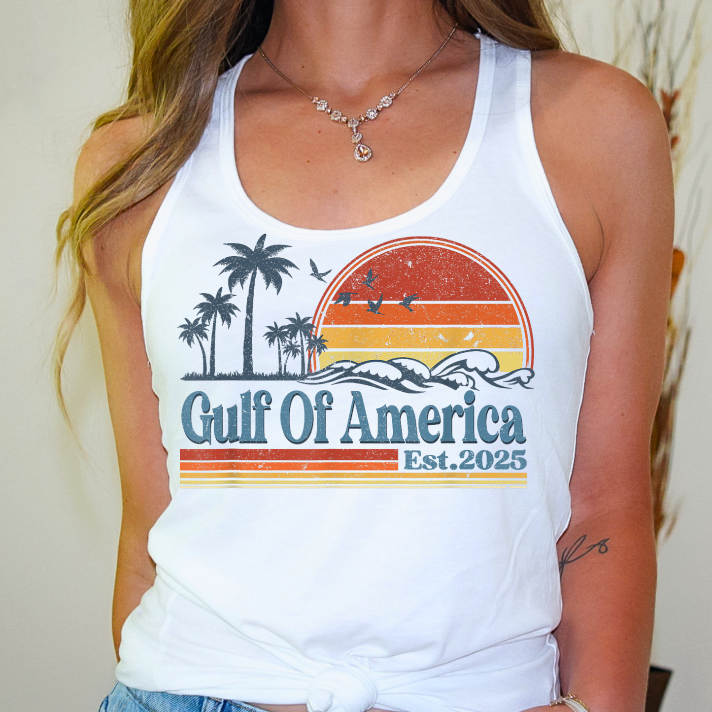  Designed for sun-seekers, ocean lovers, and those who appreciate a vintage coastal aesthetic, this soft and breathable racerback tank is perfect for summer adventures