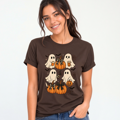 A woman wearing a dark brown short-sleeve t-shirt with a Halloween graphic of four white ghosts and orange pumpkins, paired with blue jeans, against a plain white background.