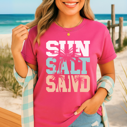 Dark pink graphic tee styled with plaid beach cover-up