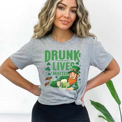 Woman wearing a gray Drunk Lives Matter Tshirt with a leprechaun holding a beer mug
