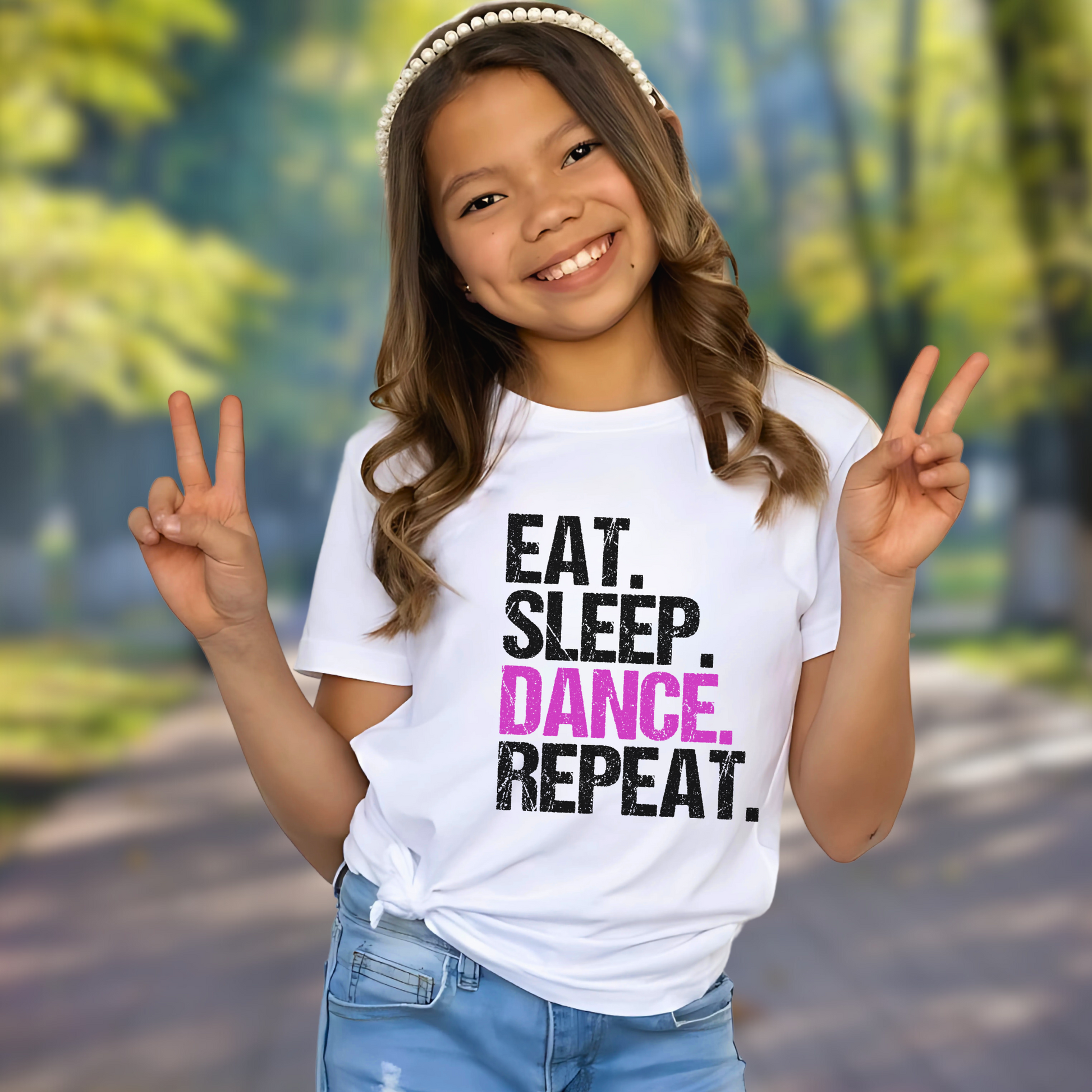 Dance all day in this trendy ‘Eat. Sleep. Dance. Repeat.’ T-shirt! Made for comfort and style, this tee is perfect for hip-hop, ballet, and jazz dancers. A must-have for any dance lover!