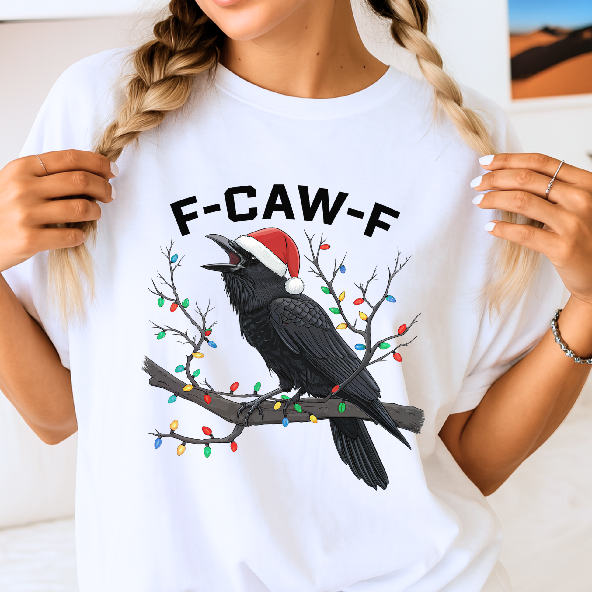 Woman wearing white Christmas crow shirt with F-CAW-F text and lights.