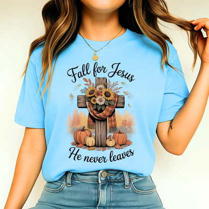 Person wearing a blue t-shirt with 'Fall for Jesus' design featuring a cross, sunflowers, and pumpkins.