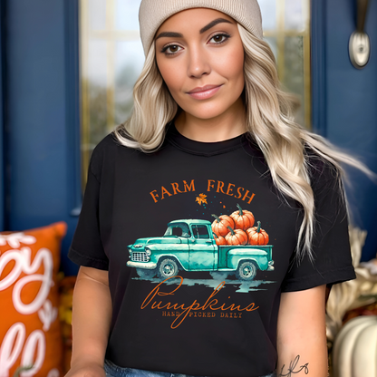 Woman in black "Farm Fresh Pumpkins" shirt styled with beanie for cozy fall look