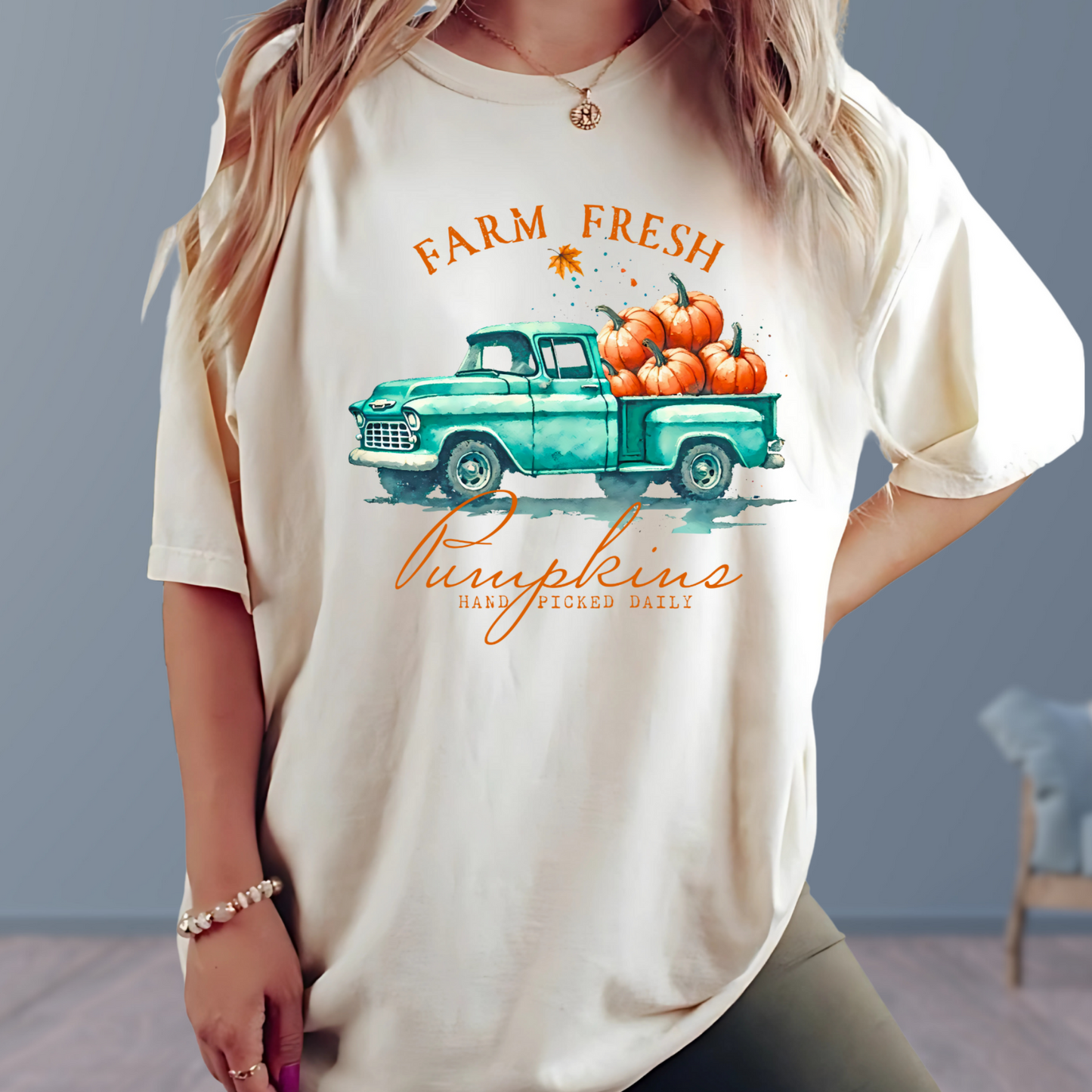 Sand oversized tee with watercolor pumpkin truck design for women

