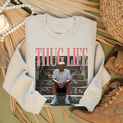 Folded Sand sweatshirt with Thug Life Trump design