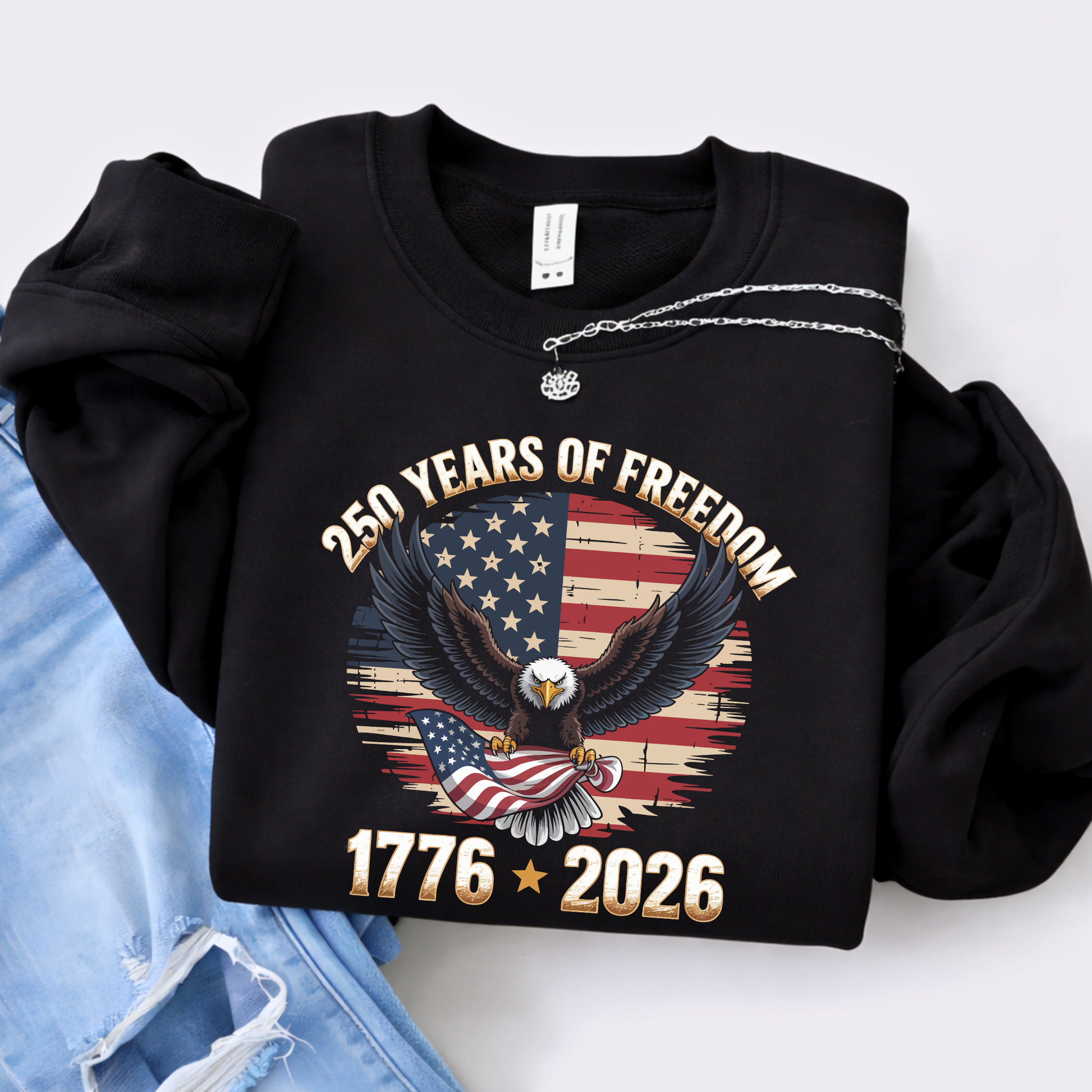 Folded black patriotic sweatshirt with 250 Years of Freedom design