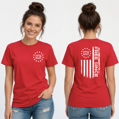 Front and back views of a red T-shirt with a white 1776 Patriot chest emblem and distressed Free Since flag graphic