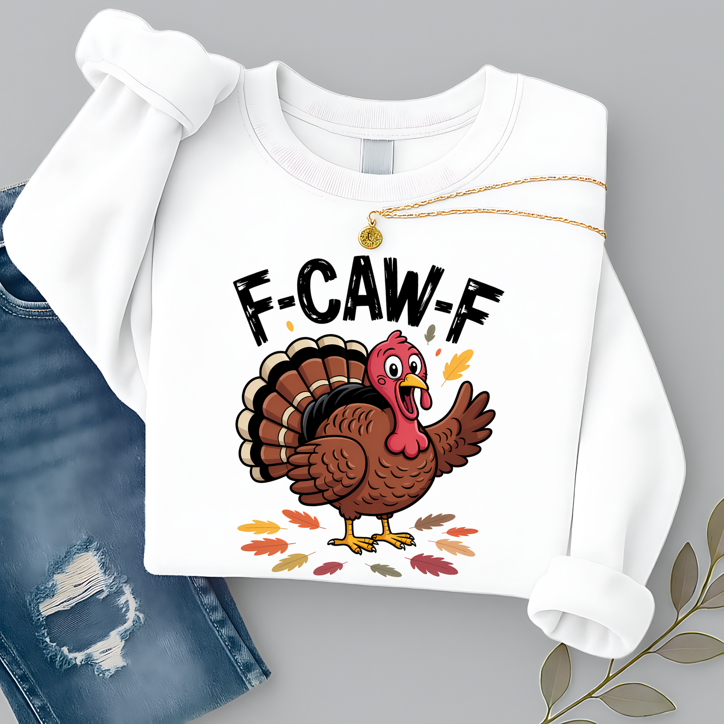White crewneck sweatshirt with turkey and fall leaf design for Thanksgiving