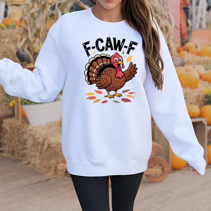 Woman wearing white F-CAW-F Thanksgiving sweatshirt outdoors