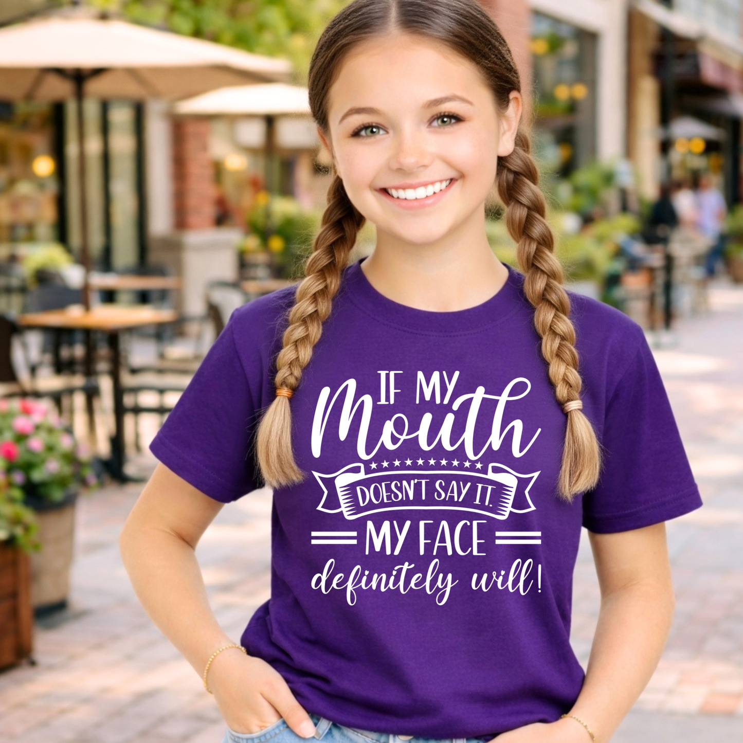 Girls purple graphic t-shirt funny saying youth shirt if my mouth doesnt say it my face definitely will outdoor mockup