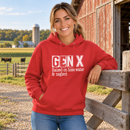 Woman wearing a red GEN X Raised on hose water & neglect hoodie by a farm fence.
