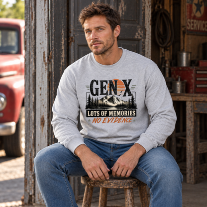 Men's sports gray Gen X sweatshirt with Lots of Memories No Evidence mountain design, modeled seated in a vintage workshop
