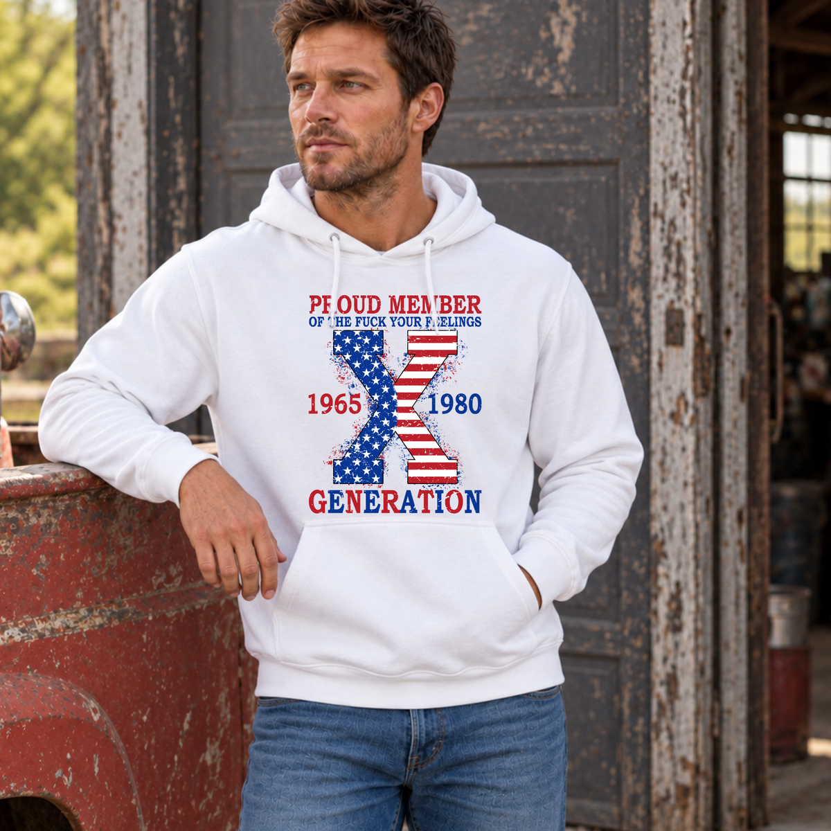 Men's white hoodie with patriotic Generation X 1965–1980 graphic, modeled beside a vintage red truck