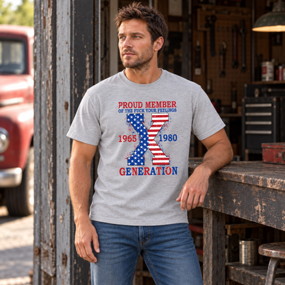 Men's sports gray T-shirt with American flag Generation X 1965–1980 design, modeled in a rustic garage