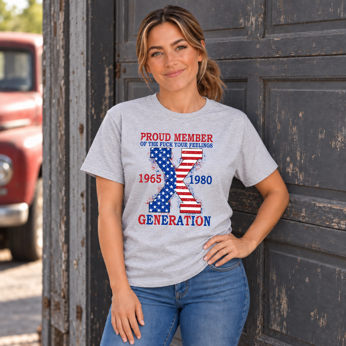 Women's sports gray T-shirt with patriotic Generation X 1965–1980 graphic, modeled with one hand on her hip
