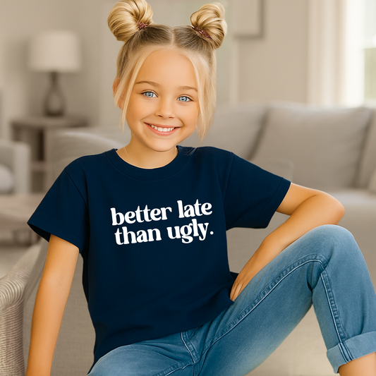 Girl in navy tee sitting on couch – youth funny quote shirt for confident kids