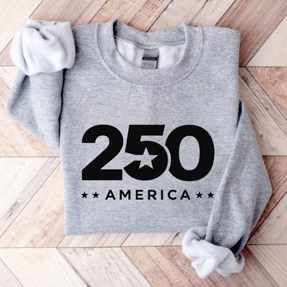Gray sweatshirt with '250 America' print on a wooden floor