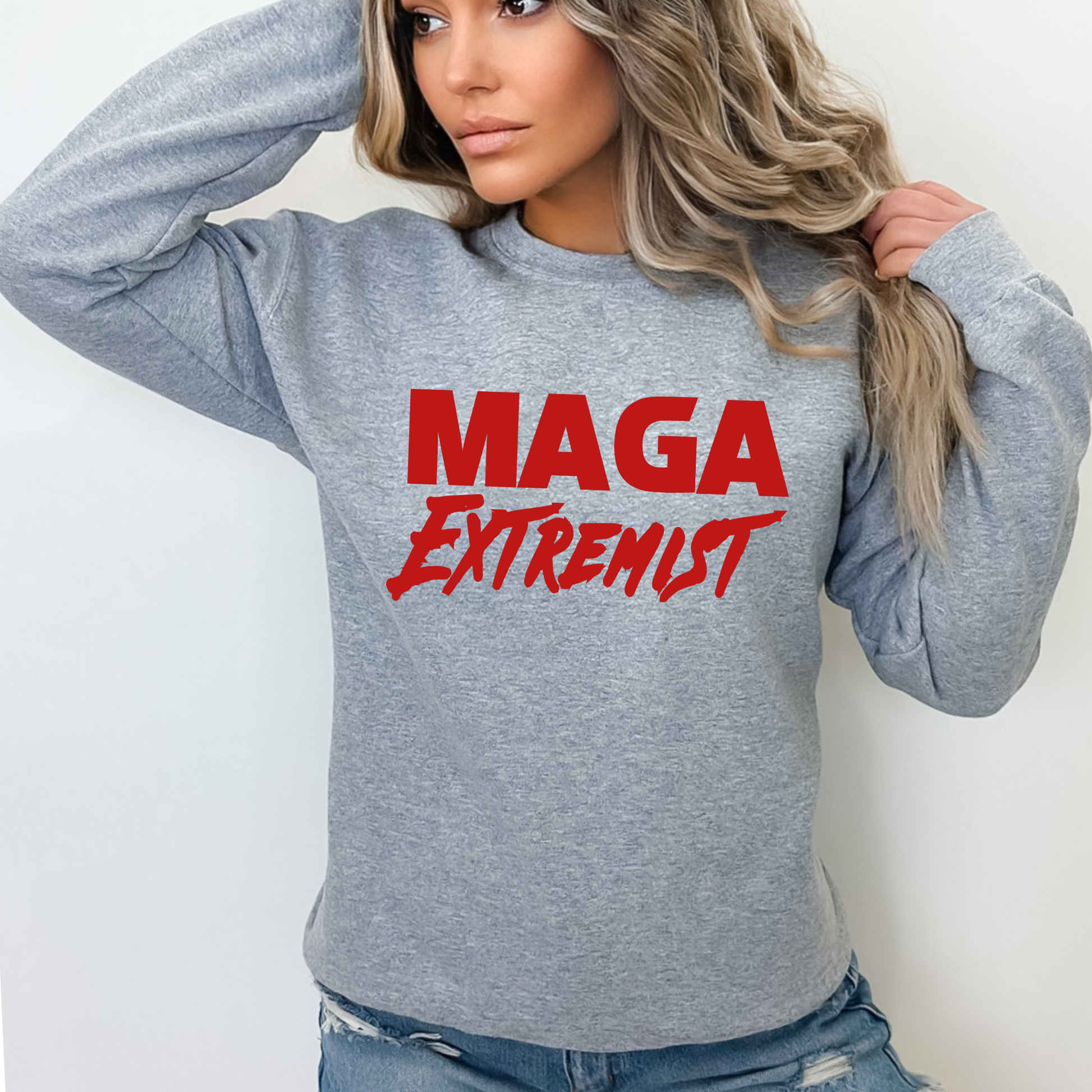 Gray women’s sweatshirt styled with MAGA Extremist print