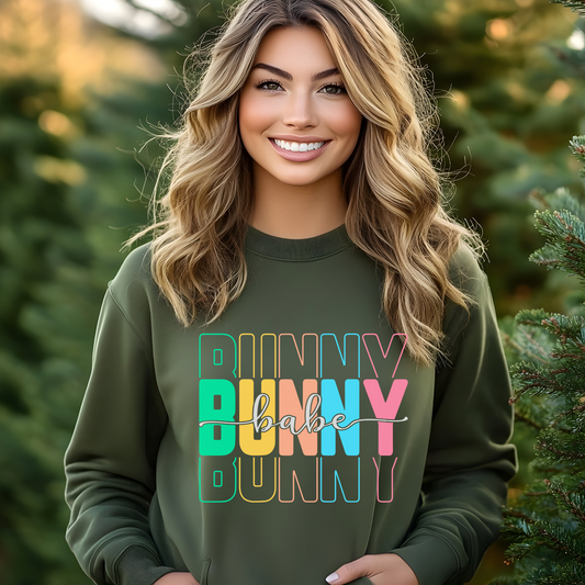 Green Trendy Bunny Babe sweatshirt with colorful pastel typography, perfect for Easter, spring fashion, and cozy loungewear