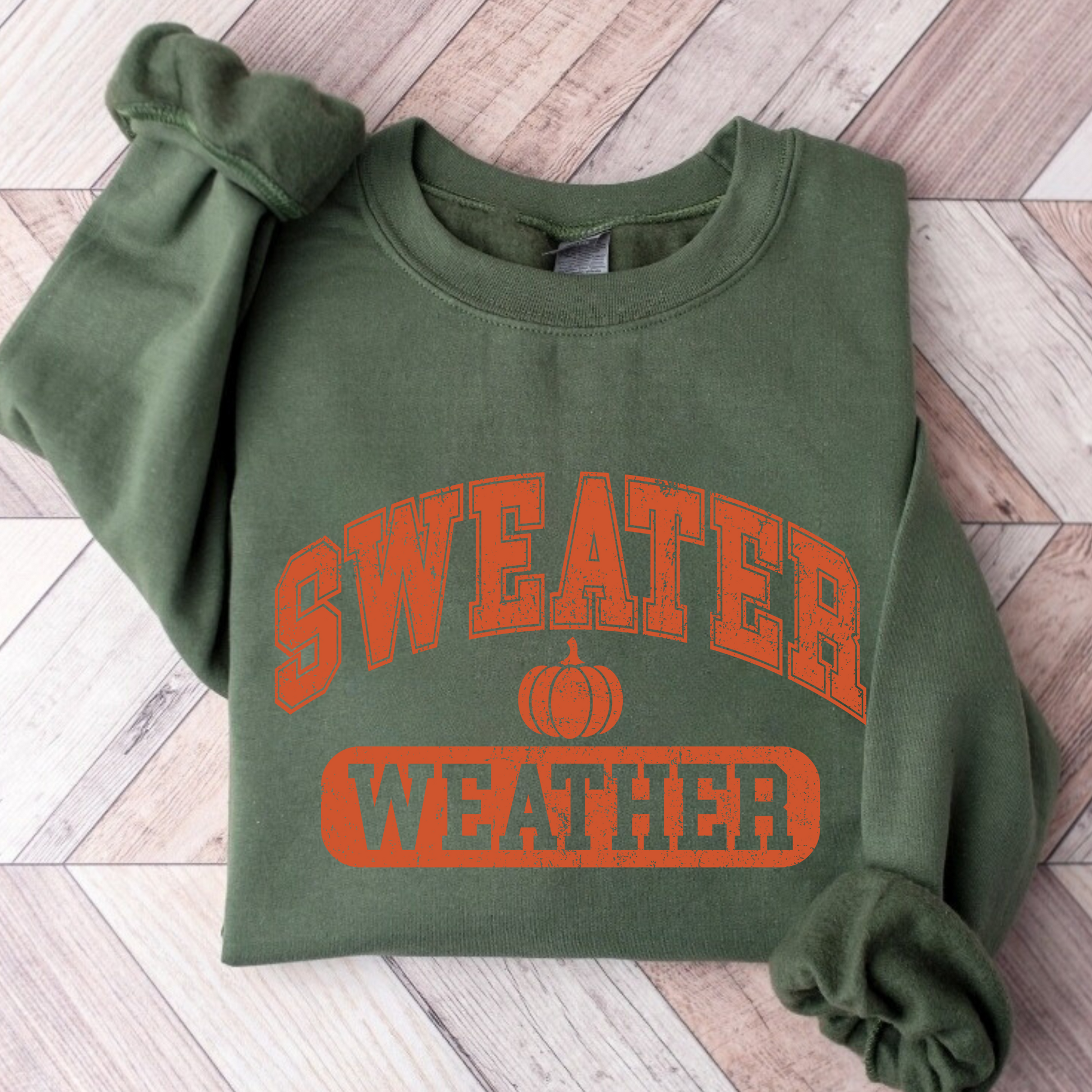 Green sweatshirt flat lay – neutral autumn pullover