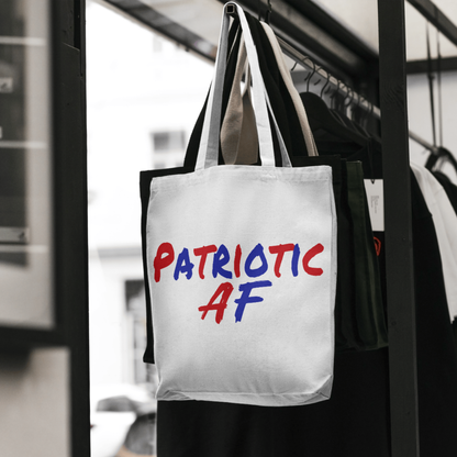 Patriotic AF tote bag hanging in retail display setting