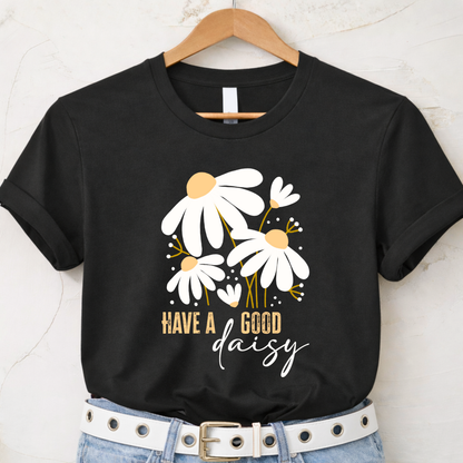 Black t-shirt with daisy design and text 'Have a good daisy' on a hanger.