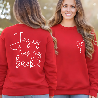 Red sweatshirt with 'Jesus has my back' text on the back, worn by a person.