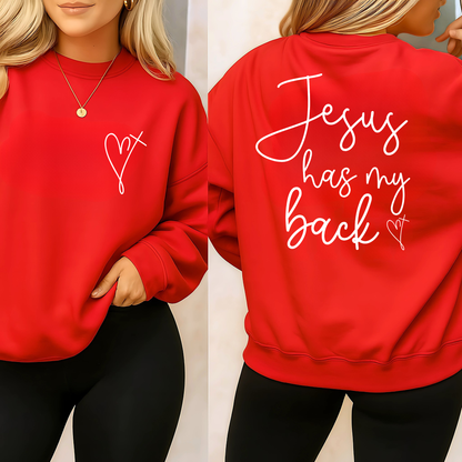 Red sweatshirt with 'Jesus has my back' text on the back, worn by a person.