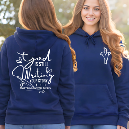 Navy Christian hoodie back view featuring God Is Still Writing Your Story faith design