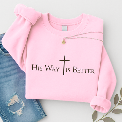 Light pink sweatshirt with “His Way Is Better” cross design