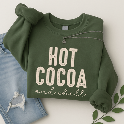 Hot Cocoa and Chill sweatshirt in green – cozy flat lay with jeans