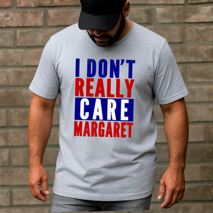 Man wearing gray t-shirt with bold red, white, and blue text reading "I Don’t Really Care Margaret"