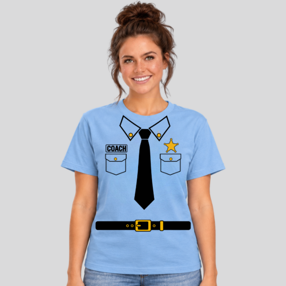 Front view of a woman wearing a light blue police-style Roctown coach T-shirt with a printed collar, black tie, gold badge, pockets and belt. The sample COACH name tag is personalized with the coach’s last name.