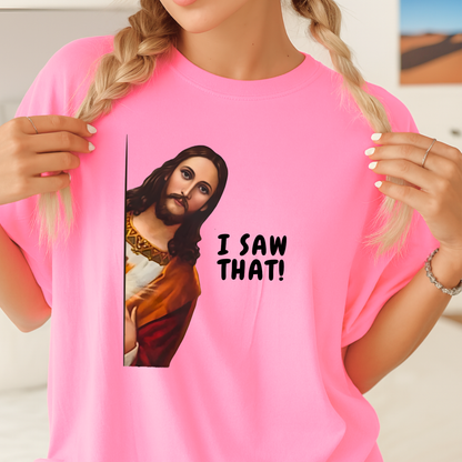 Woman wearing I Saw That funny Jesus graphic t-shirt in pink
