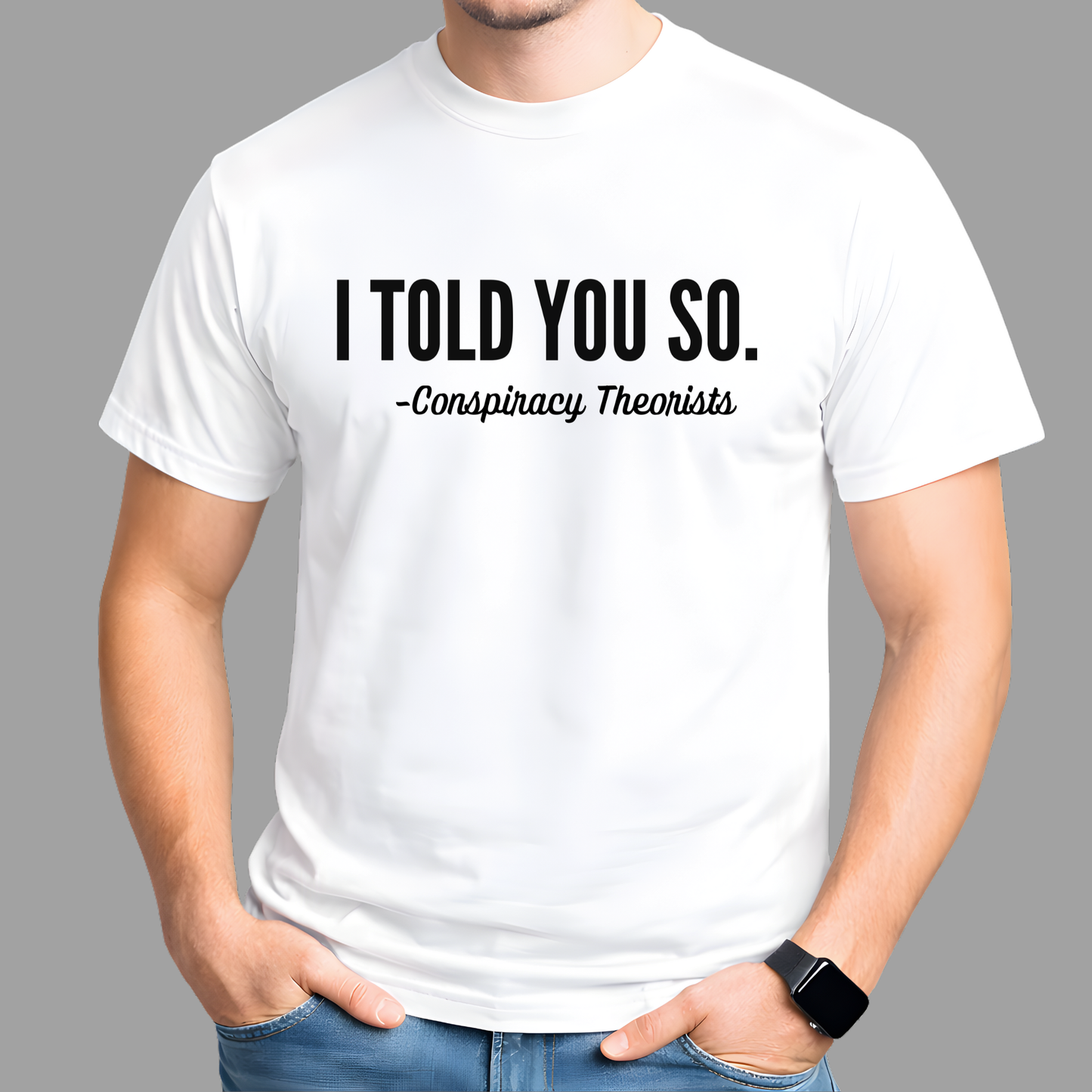 Man wearing white short sleeve t-shirt with “I Told You So – Conspiracy Theorists” text print