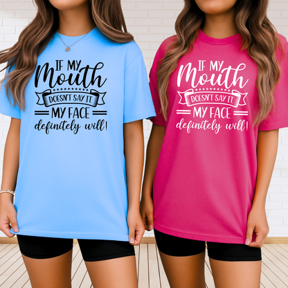 Two women wearing blue and pink quote shirts side-by-side