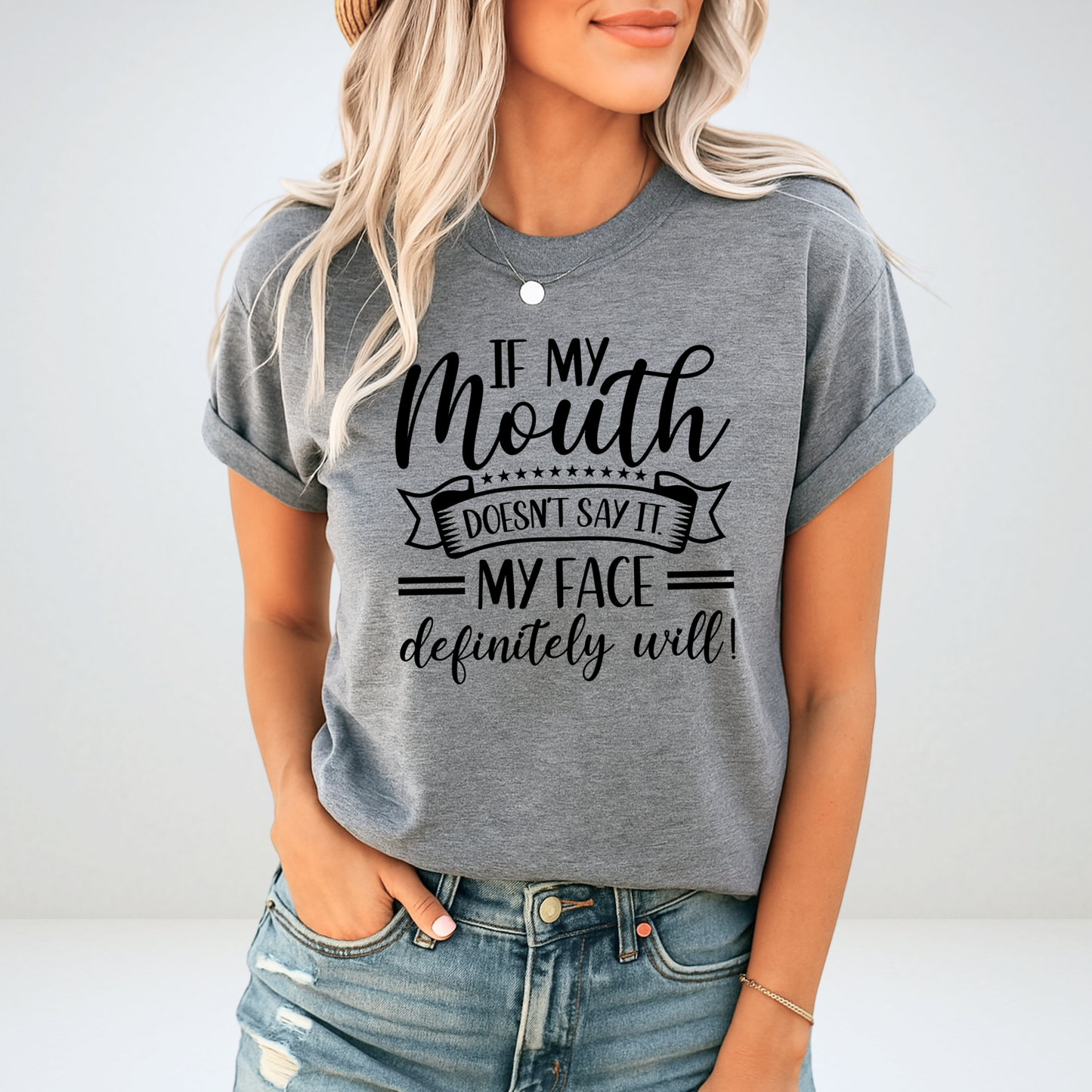 Blonde woman wearing heather gray shirt with bold typography

