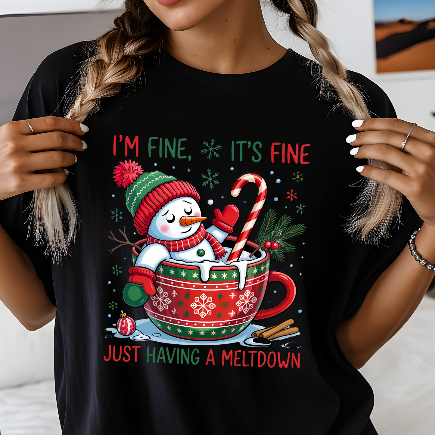 Woman wearing black funny Christmas shirt with snowman in cocoa mug, text “I’m Fine It’s Fine Just Having a Meltdown.”