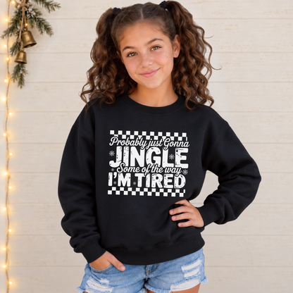 Girl wearing a black youth sweatshirt with white Probably Just Gonna Jingle Some of the Way I'm Tired Christmas design