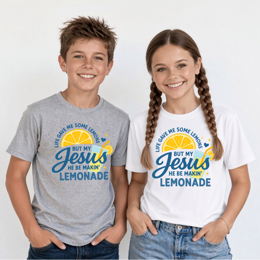 Youth boy in sports gray T-shirt and youth girl in white T-shirt wearing the Jesus Be Makin’ Lemonade faith graphic.