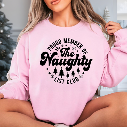 Light pink sweatshirt with black “Proud Member of the Naughty List Club” design – cozy holiday sweatshirt for women.